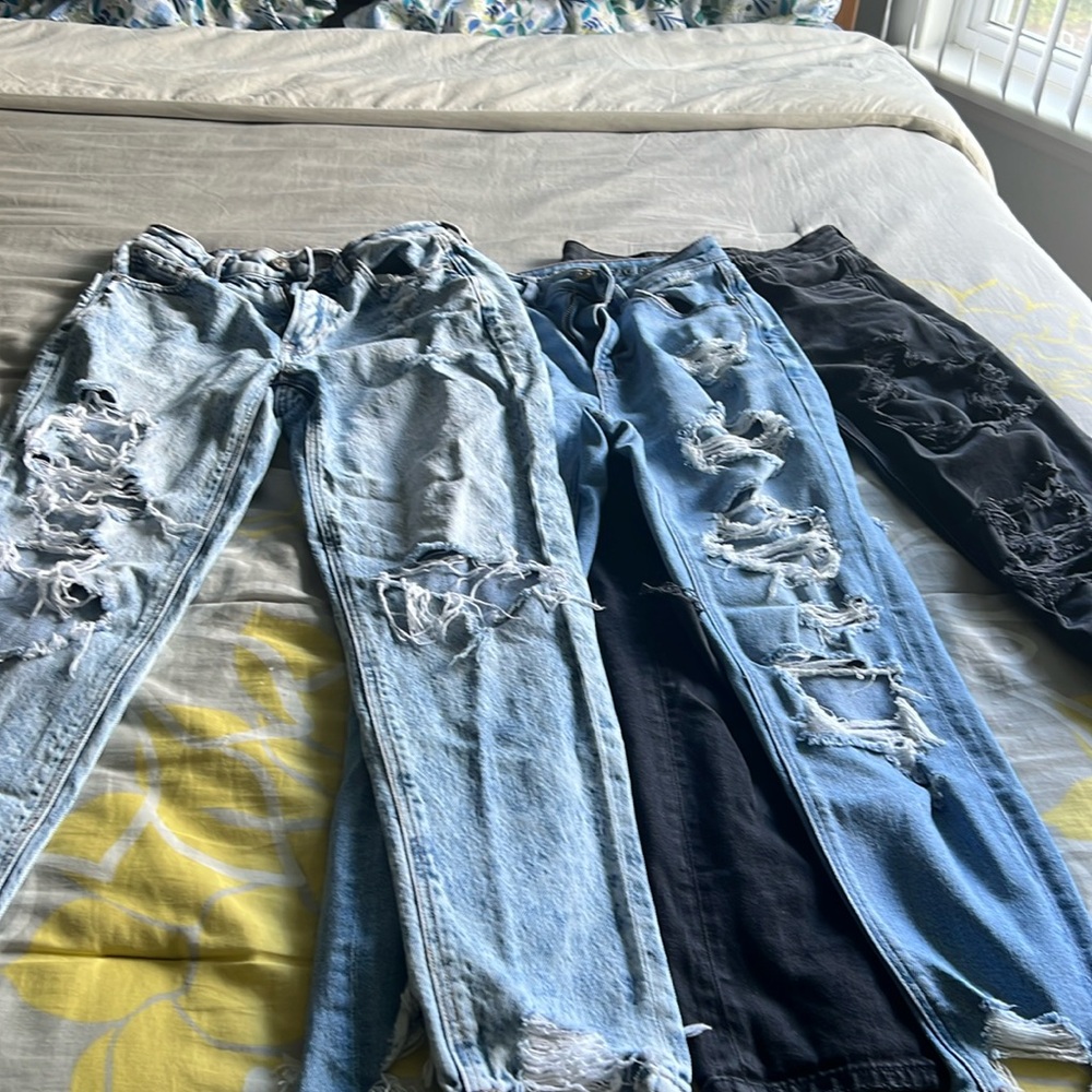 Three pair American Eagle jeans